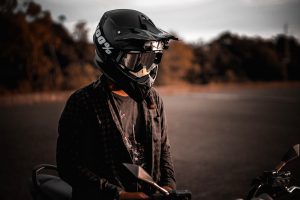 Motorcyclist wearing a helmet